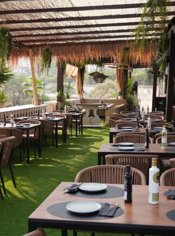 Tables set for lunch at Limboo Beach Club, Tarragona